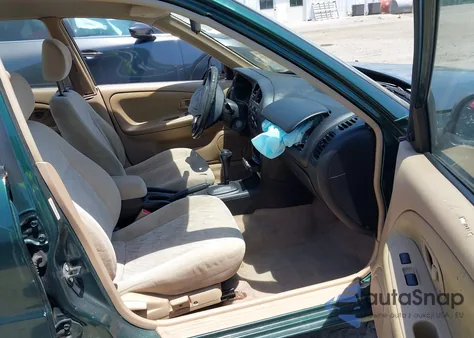 2001 Mitsubishi Mirage Es from USA, damaged, VIN JA3AY26CX1U041643